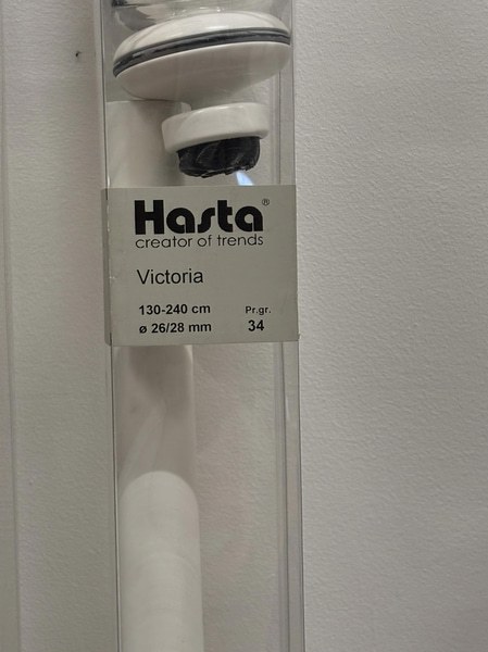 Lot of curtain rods in various styles and sizes