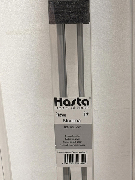 Lot of curtain rods in various styles and sizes