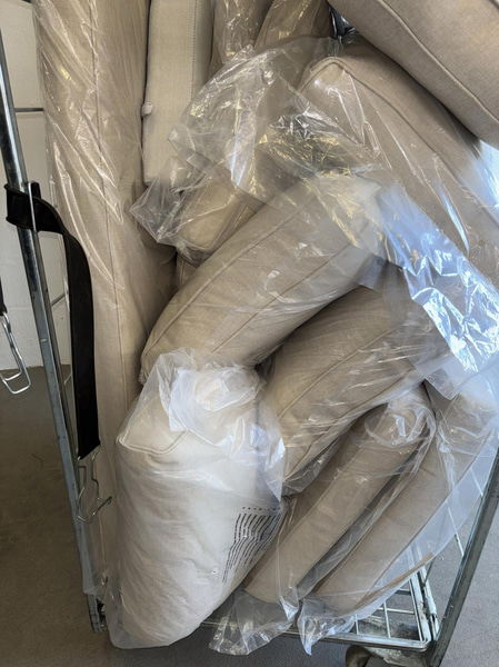 Lot of outdoor pillows and cushions, beige