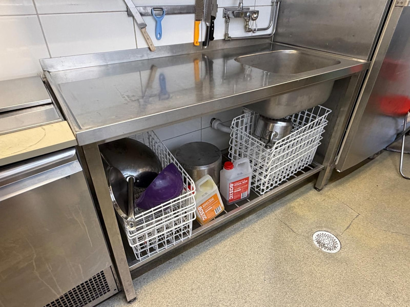Stainless steel work table with sink
