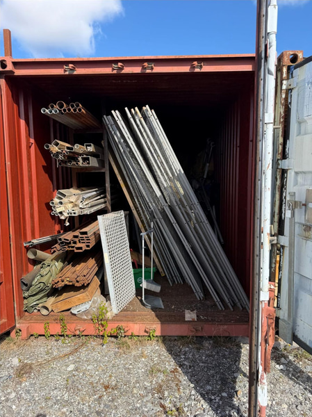 20-foot container with assorted materials (surplus materials and temporary cold-room doors)