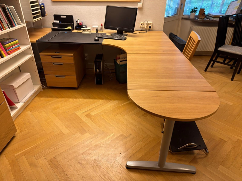 Corner desk with chair and mobile pedestal