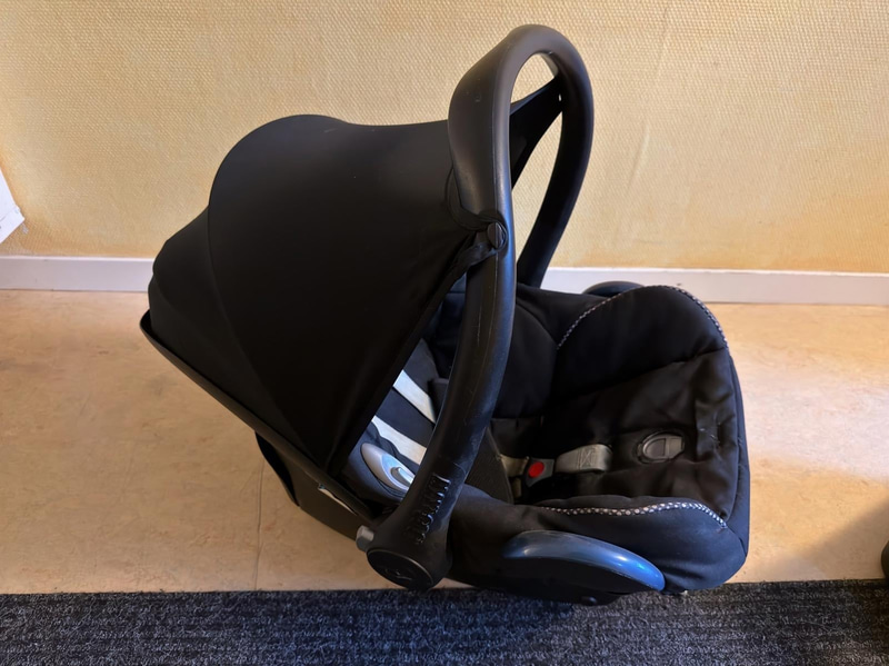 Maxi-Cosi infant car seat and booster cushion