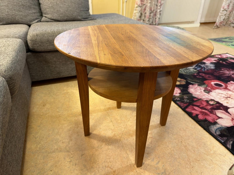 Sofa with chaise sections, coffee table and armchair