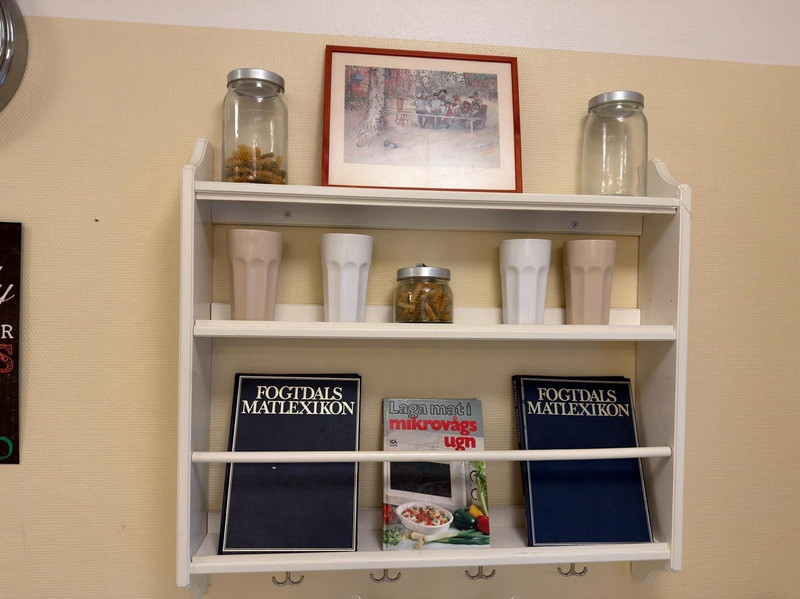 2 wall shelves and assorted decorative items.