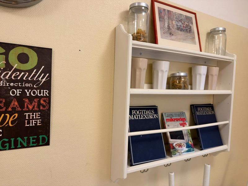 2 wall shelves and assorted decorative items.