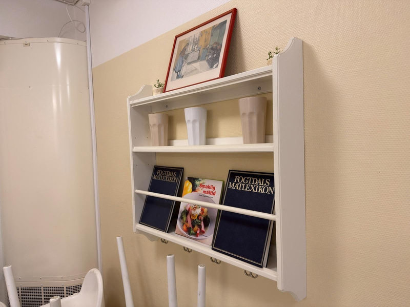 2 wall shelves and assorted decorative items.