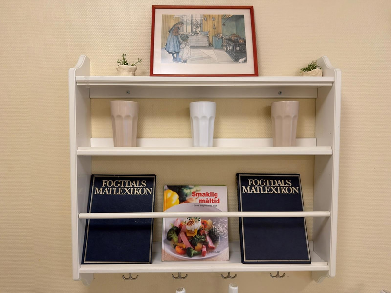 2 wall shelves and assorted decorative items.