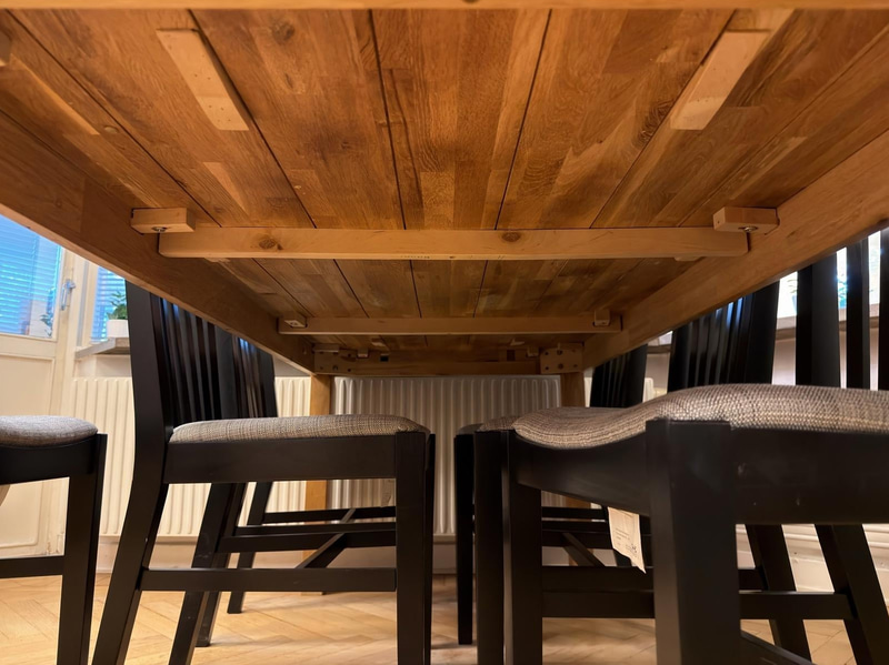 Wooden dining table with chairs