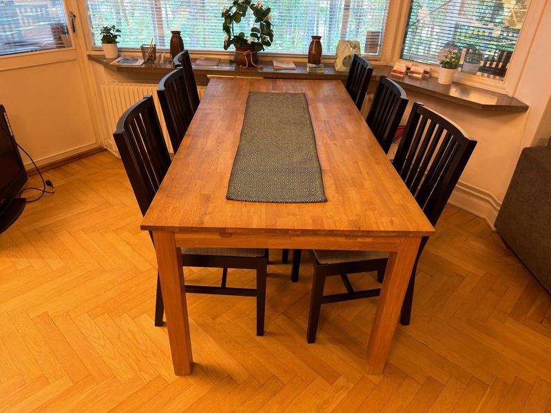 Wooden dining table with chairs