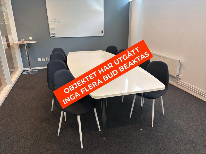 Office table including 8 Venture Design office chairs