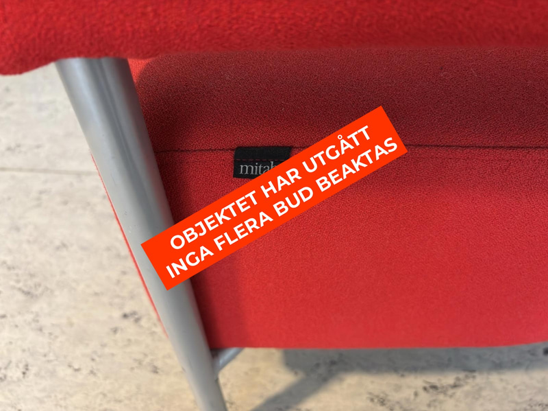 2 red Mitab armchairs