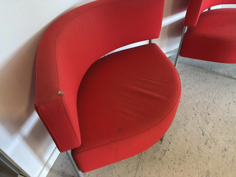 2 red Mitab armchairs