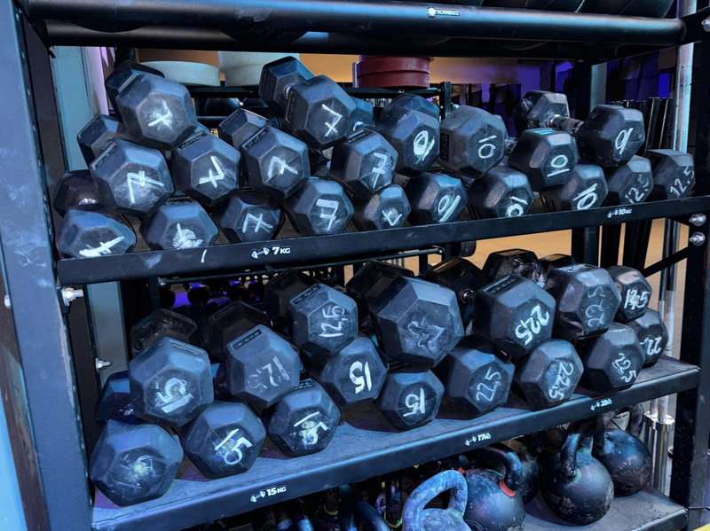 Weight rack including dumbbells and kettlebells