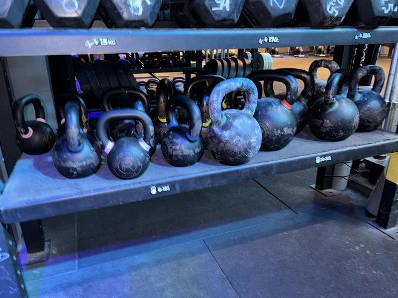 Weight rack including dumbbells and kettlebells