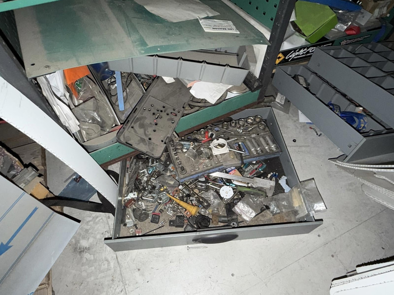 2 tool trolleys with tools and an engine hoist