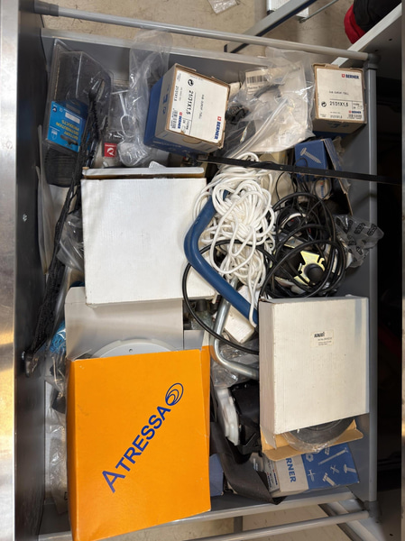 Cabinet with drawers and tall cabinet, assorted contents included