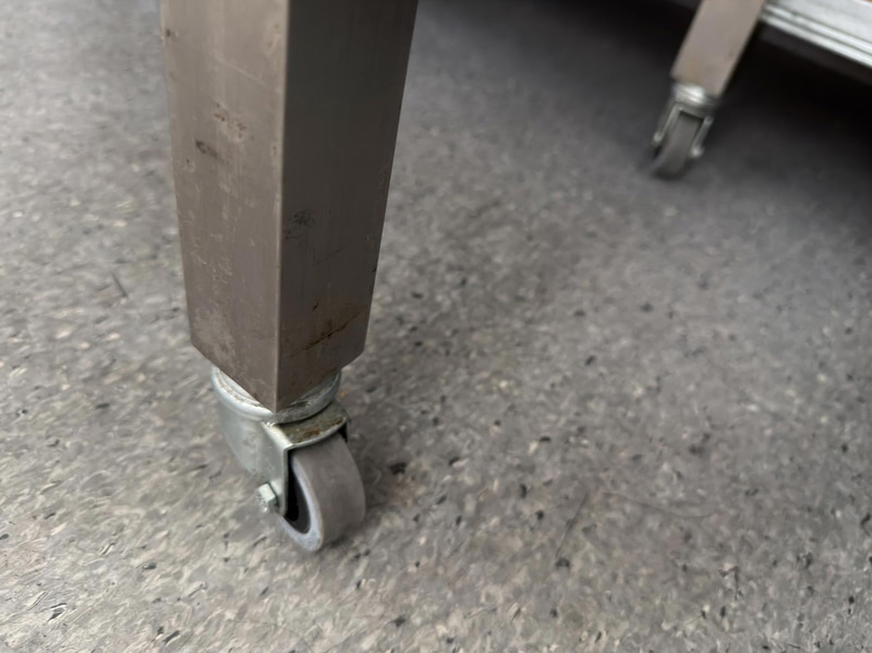 Stainless steel workbench with shelf