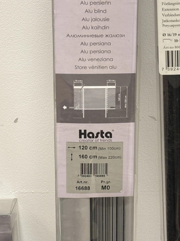 Lot of curtain rods in various styles and sizes