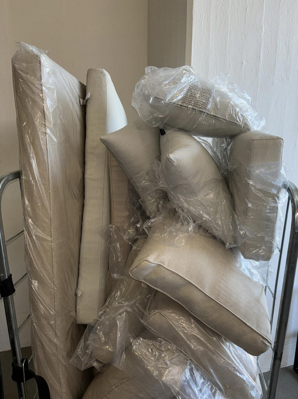 Lot of outdoor pillows and cushions, beige
