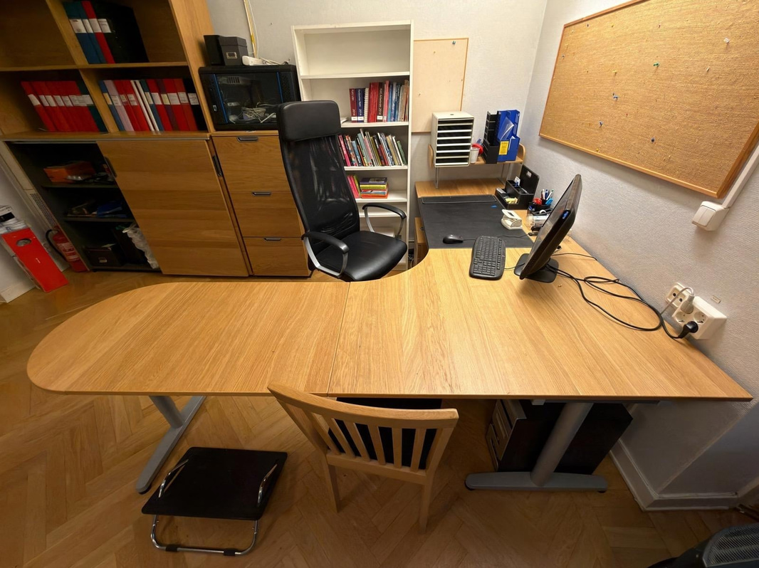 Corner desk with chair and mobile pedestal
