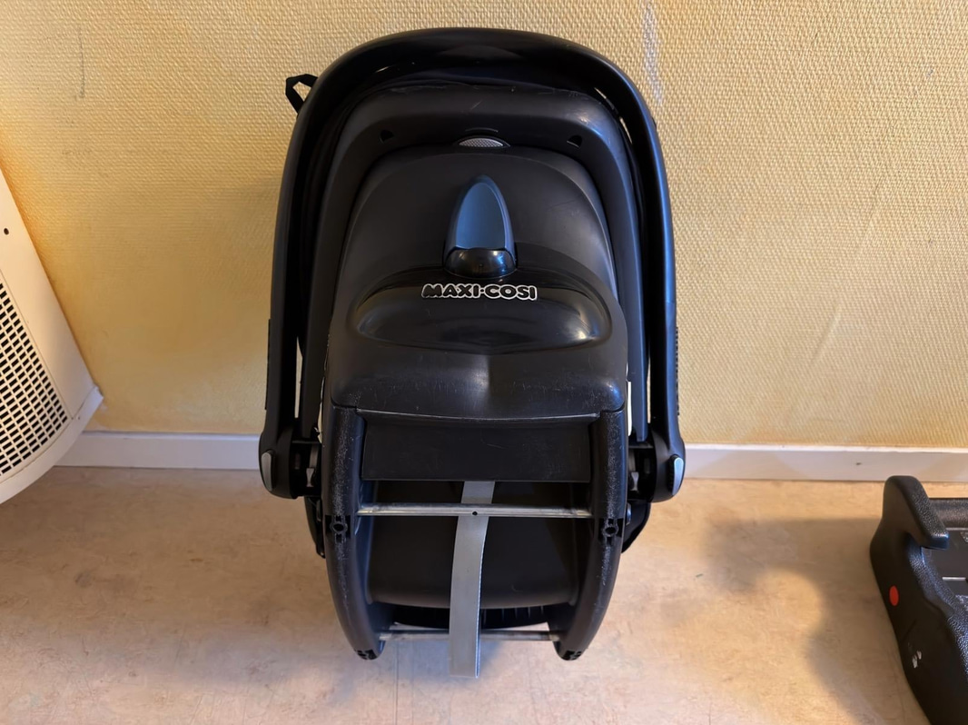 Maxi-Cosi infant car seat and booster cushion