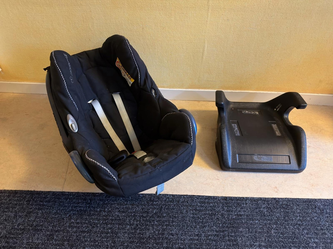 Maxi-Cosi infant car seat and booster cushion