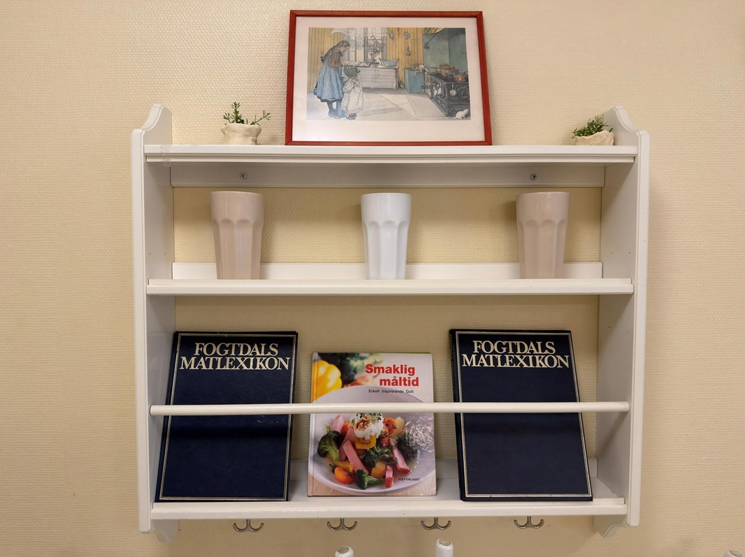 2 wall shelves and assorted decorative items.