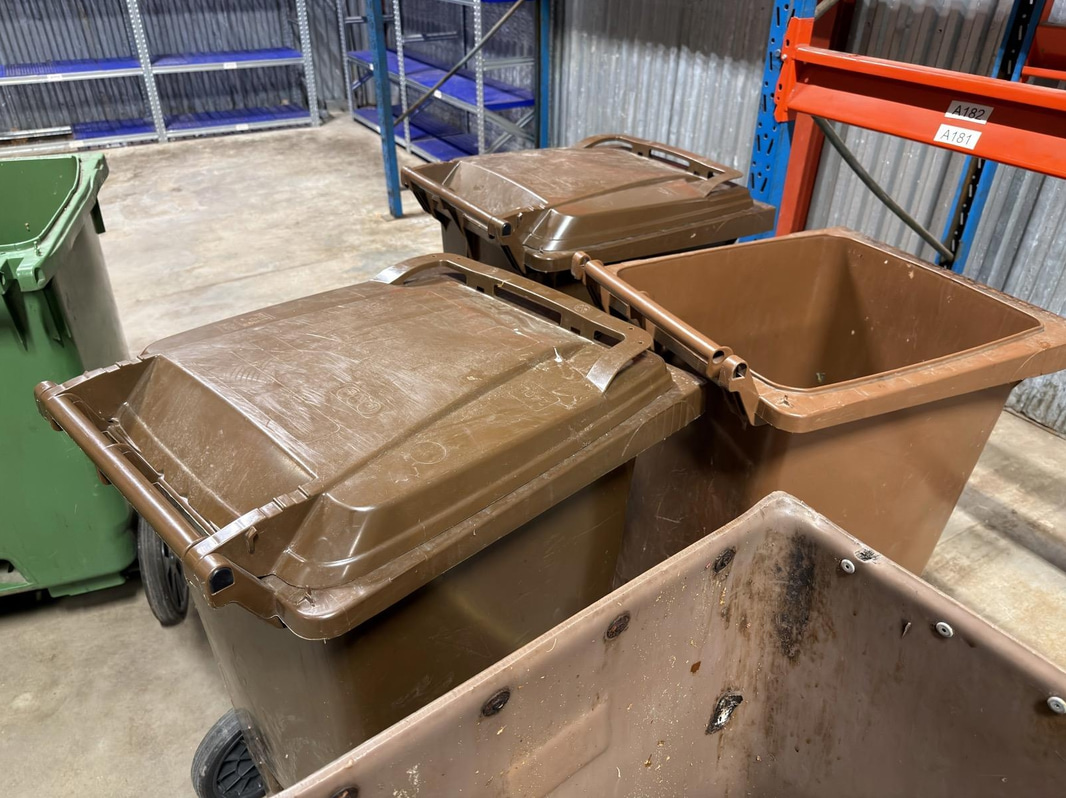 6 garbage bins