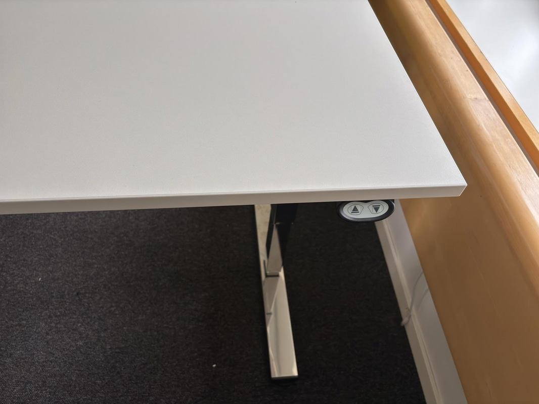 2 height-adjustable desks