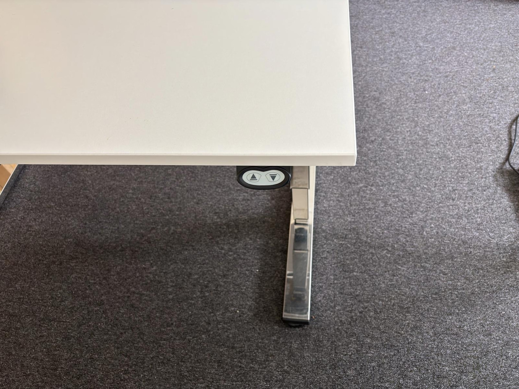 2 height-adjustable desks