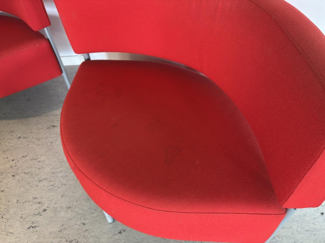 2 red Mitab armchairs