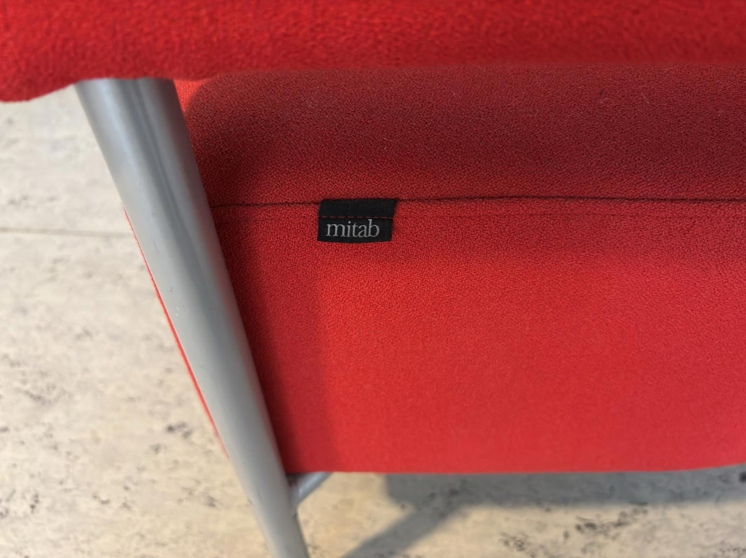 2 red Mitab armchairs