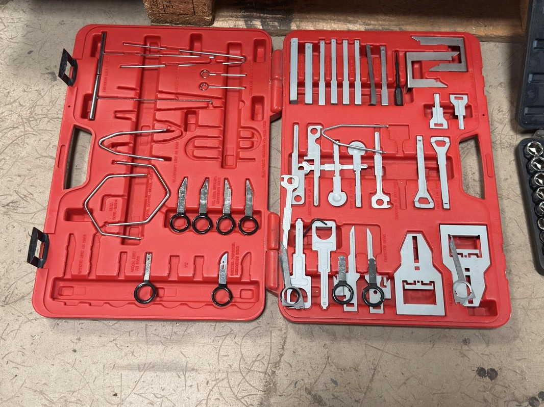 Lot of assorted toolboxes with tools