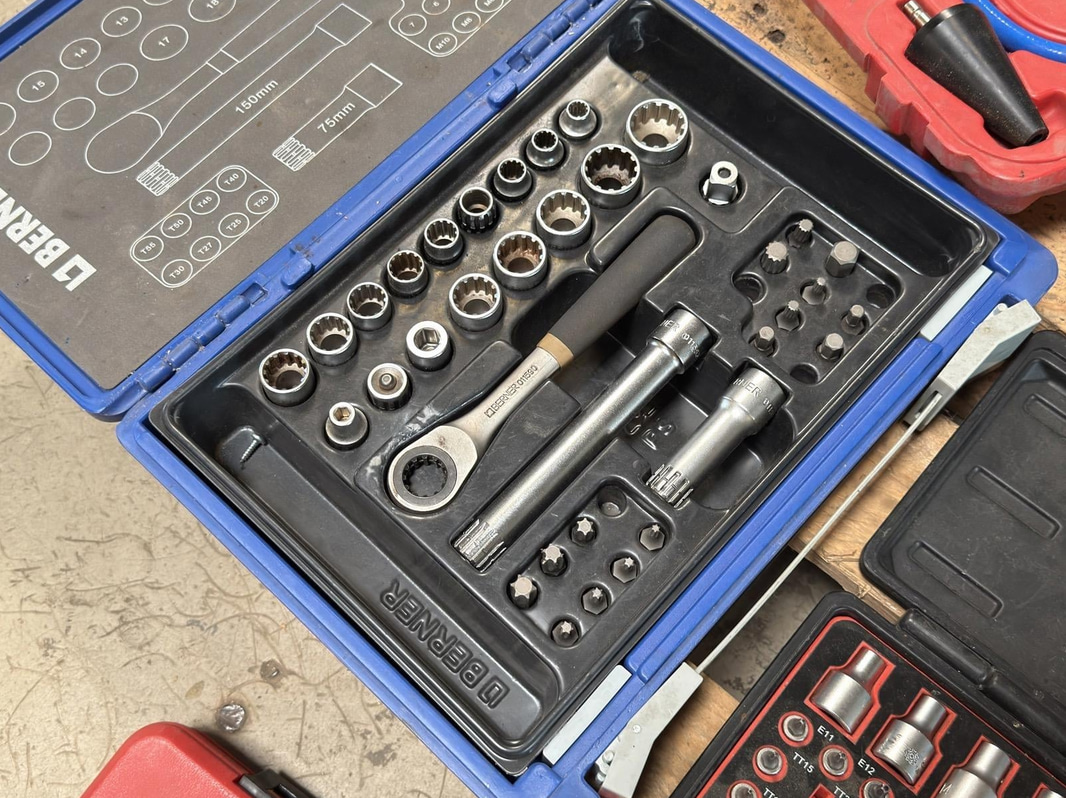 Lot of assorted toolboxes with tools