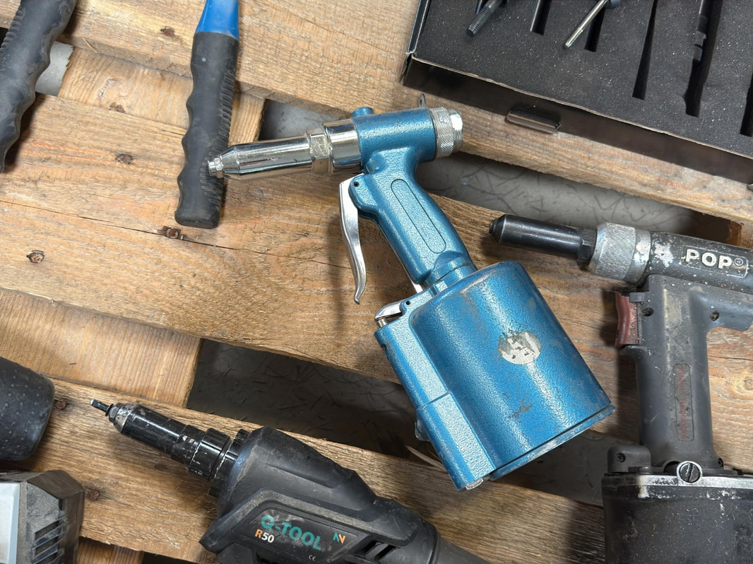 Assortment of tools for pop riveting, etc.