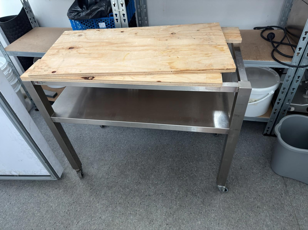 Stainless steel workbench with shelf
