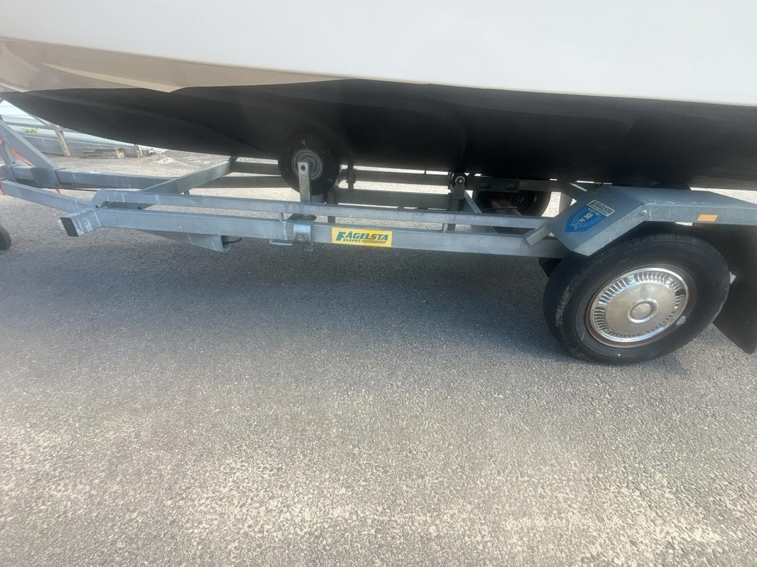 Motorbåt Ryds 530DC med Johnson 70 hk 2-takt. Längd: 5.3 m. -1988