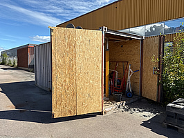 20-fots container med innehåll (bygg)