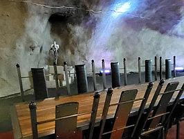 20 st. stolar i lackat stål och skinn, 2 bord i lackat stål och ek, specialdesignade