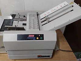 Pappersvikmaskin (paper folding machine)