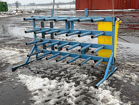 Plastrullhållare för balhantering