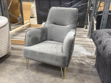 Fåtölj i grå sammet