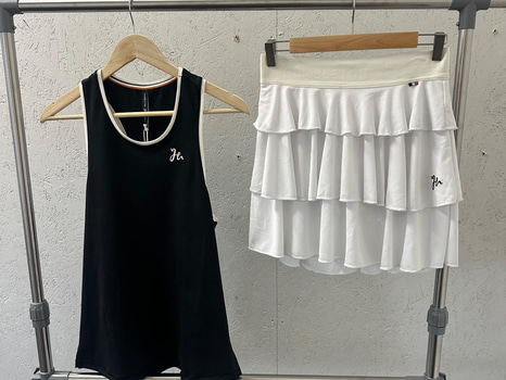 Träningslinne, stl. L, Humbleton, svart. & (NY) Tenniskjol, stl. XL, Humbleton, vit.