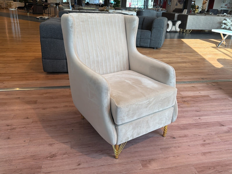 Fåtölj i beige sammet