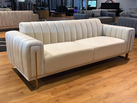 Soffa i beige sammet